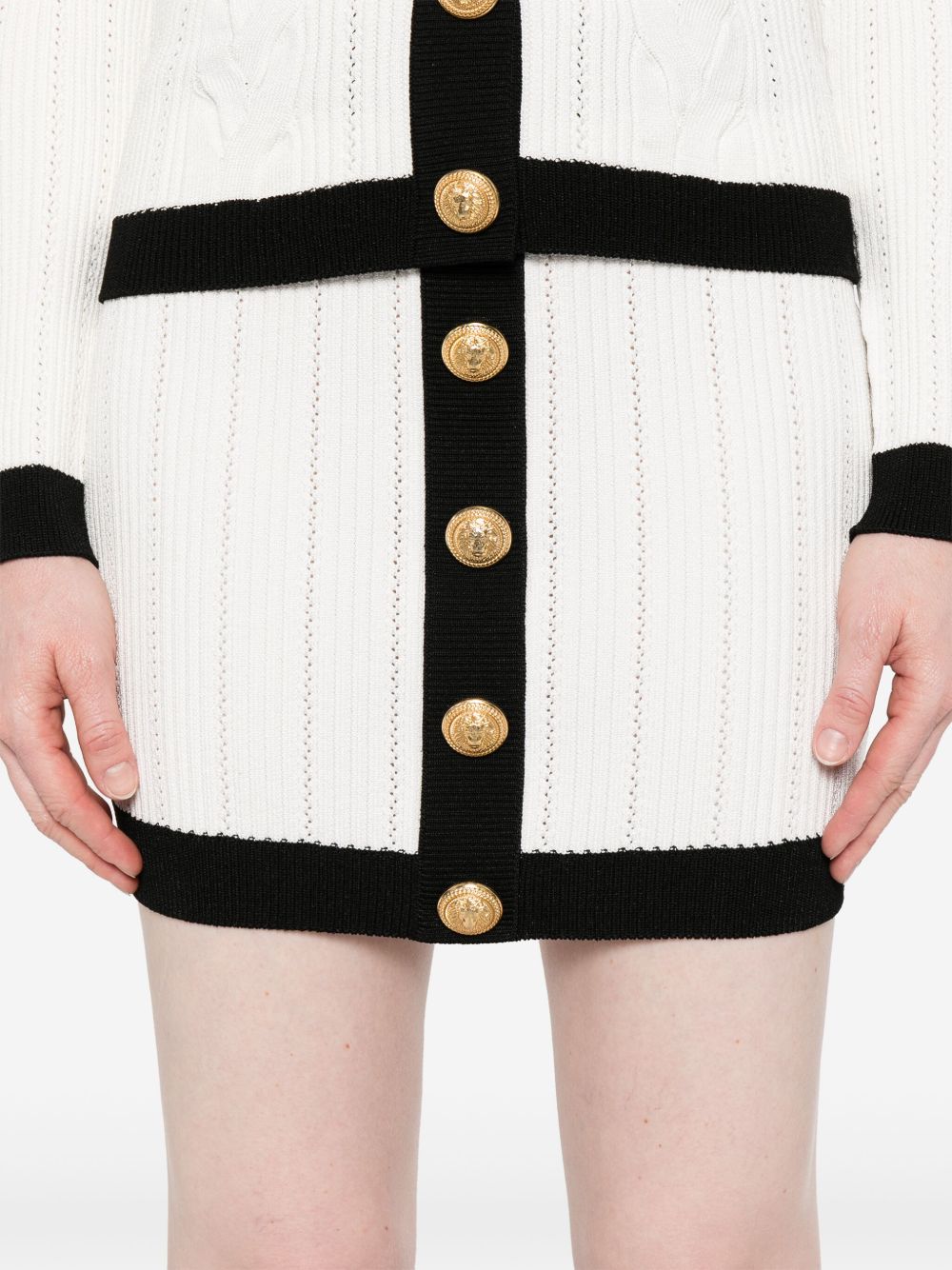 button-embellished ribbed-knit mini skirt