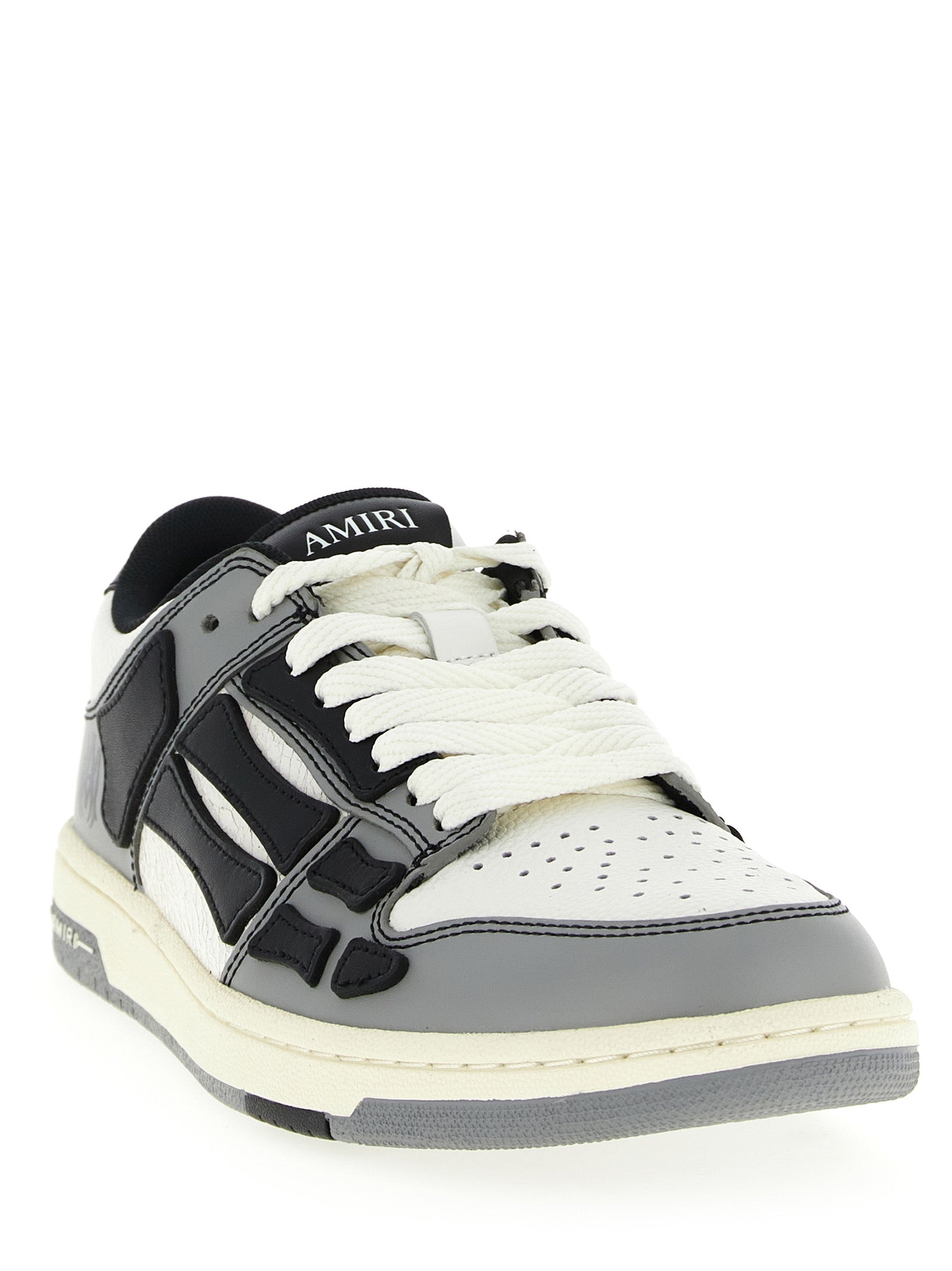 varsity skel low top sneakers